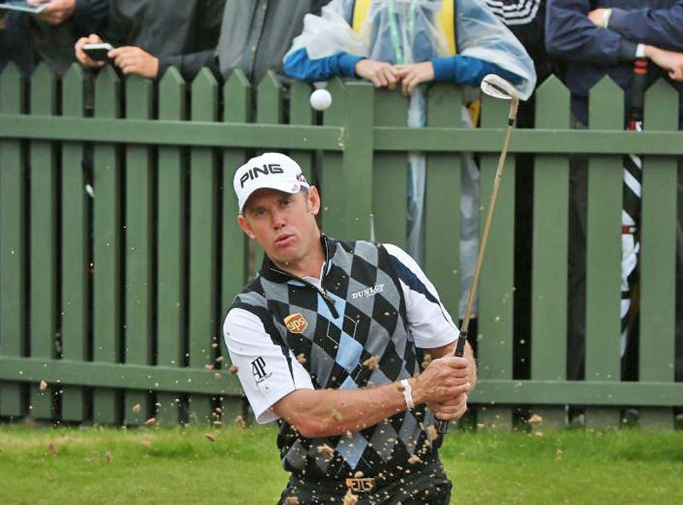 Westwood takes a wedge during practice for The Open yesterday