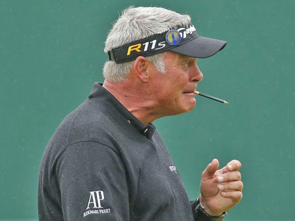 Darren Clarke keeps his pencil on hand during a practice round