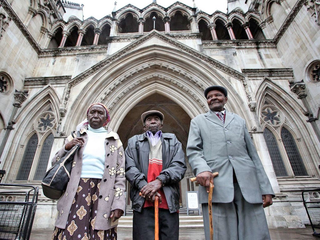 Naomi Nzyula, Paulo Muoka Nzili and Wambuga Wa Nyingi outside the High Court yesterday