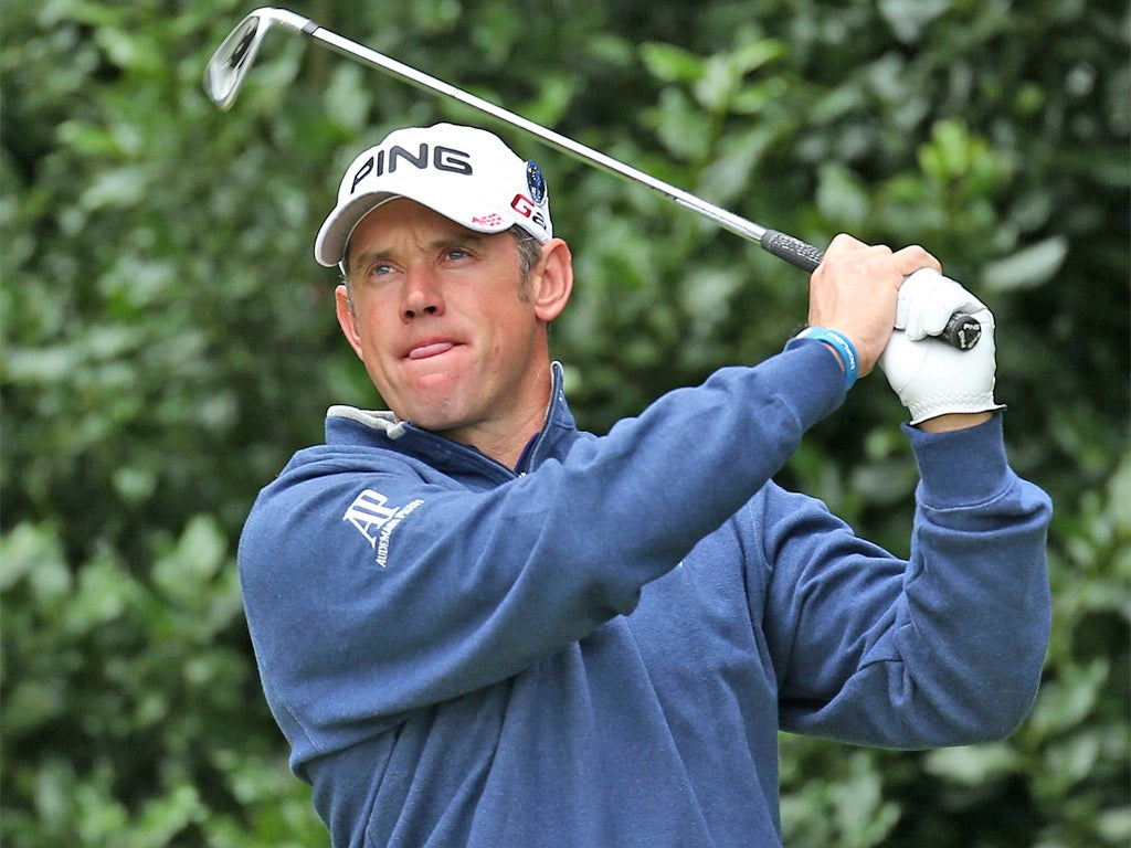Lee Westwood watches a shot in yesterday's practice round
