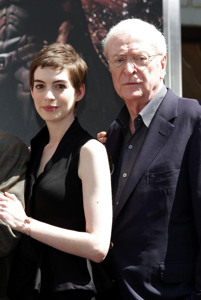 Michael Caine revisiting Batman's Alfred: pictured with Cat Woman Anne Hathaway