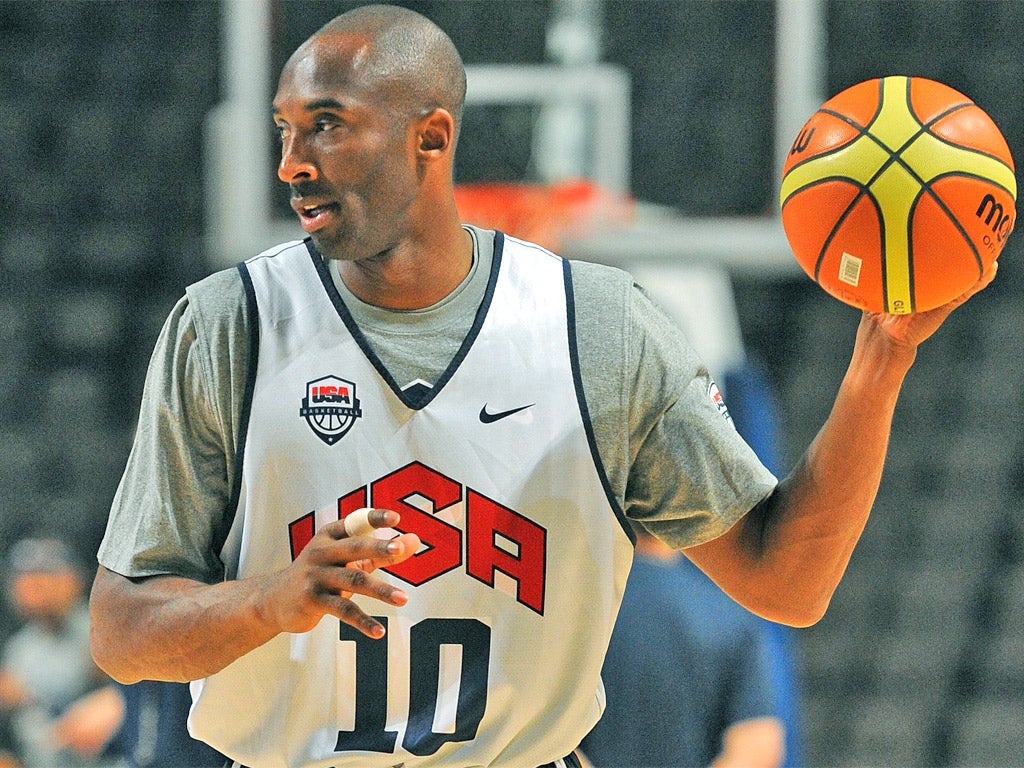 Kobe Bryant, one of the highest-paid athletes at the Games, practises a few drills at a US training session at Manchester Arena