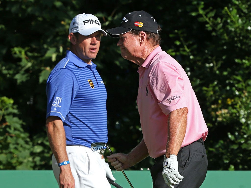 Support act: Tom Watson (right) tries to rally Lee Westwood, but his own game was in a bad way, too