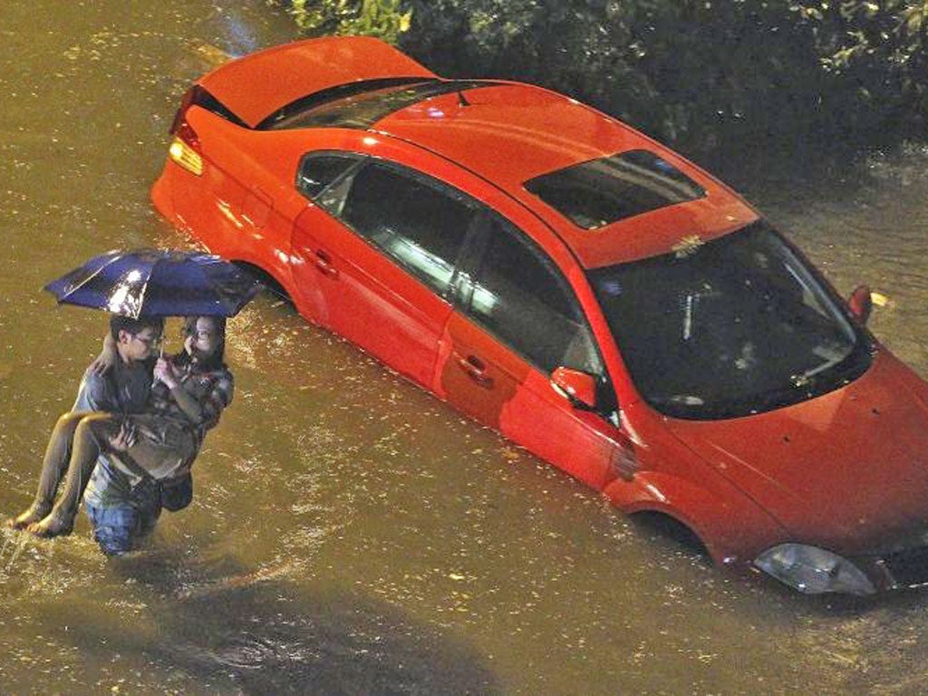 The heaviest rain to hit Beijing in six decades killed at least 37 people