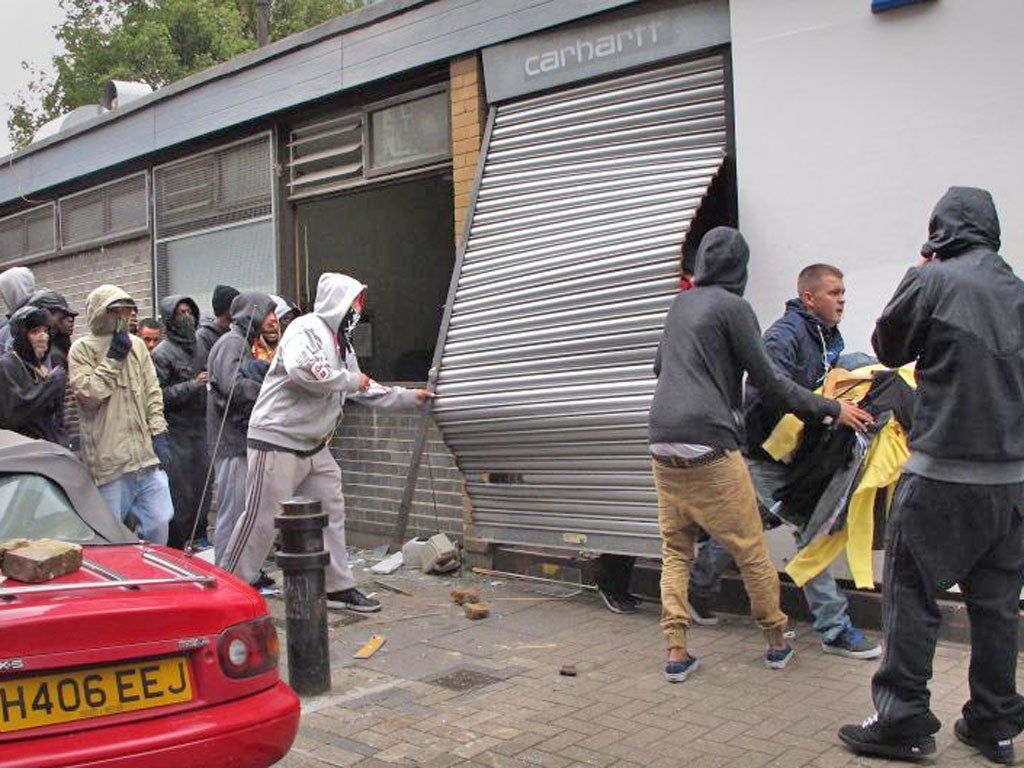 Looters raid a Carhartt store in Hackney during last summer’s
violence
