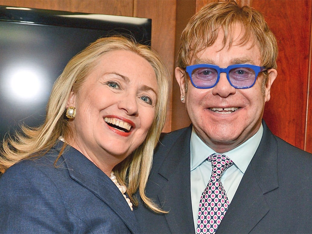 Hillary Clinton joins Sir Elton John at an event linked with the International Aids Conference in Washington
