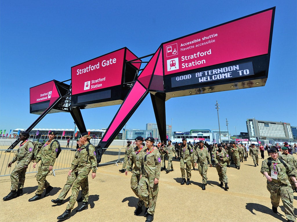 Female British Army personnel arrive to patrol the Olympic Park in Stratford, east London