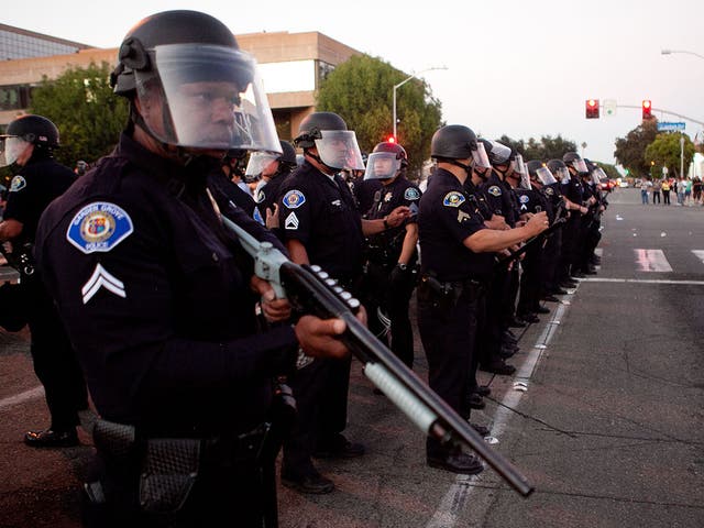 Police stand guard outside Anaheim City Hall