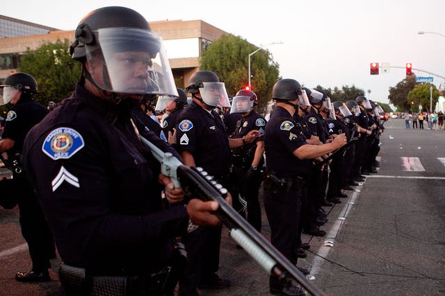 Police stand guard outside Anaheim City Hall