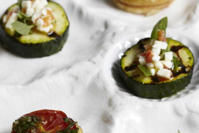 Tomato and basil tarts and courgette and feta tarts