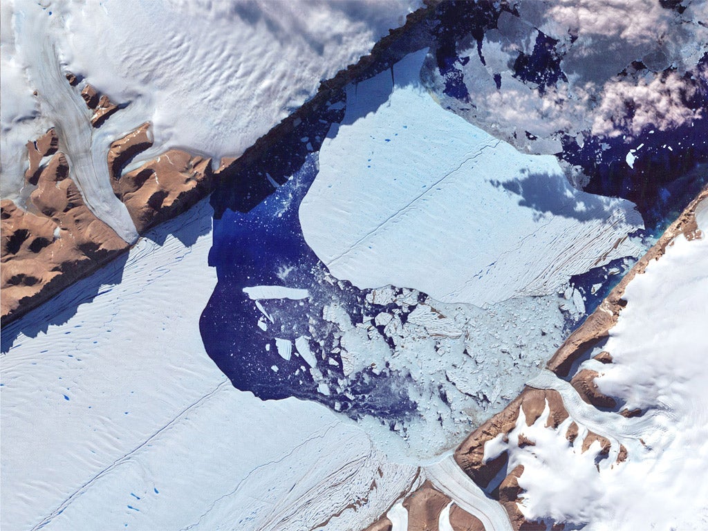 This iceberg, bigger than Manhattan, recently broke off the Petermann glacier