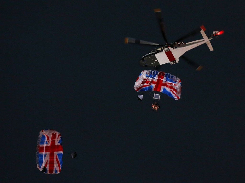 'The Queen' and James Bond parachute into the stadium