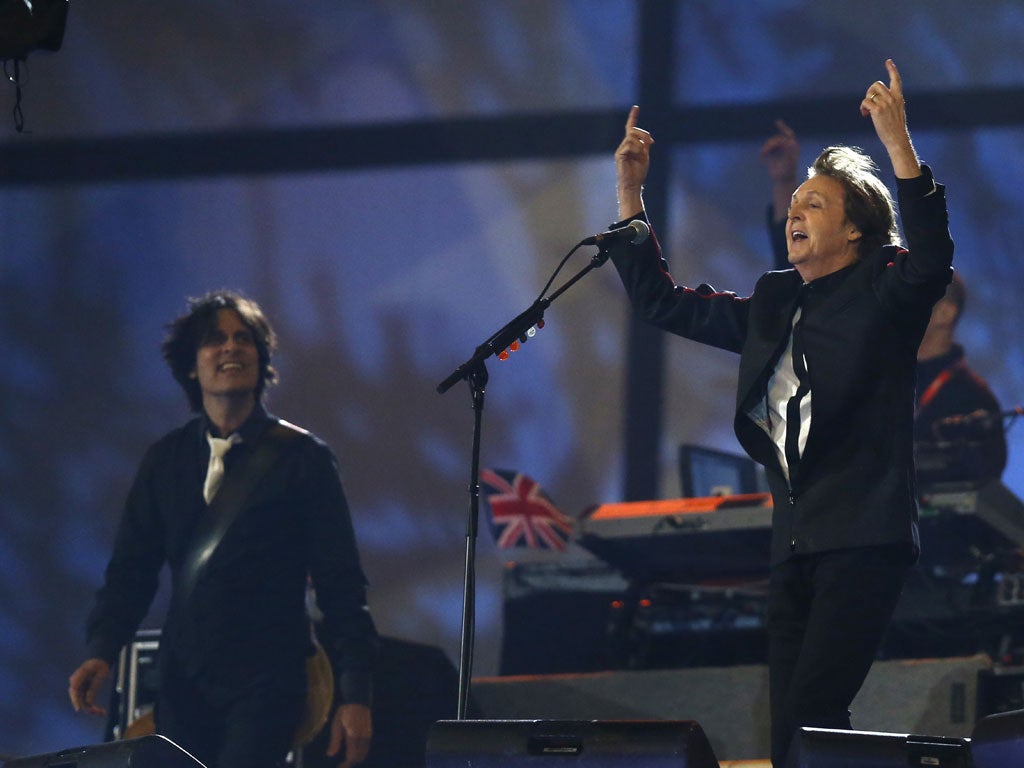 Paul McCartney performs at the climax of the Olympic ceremony