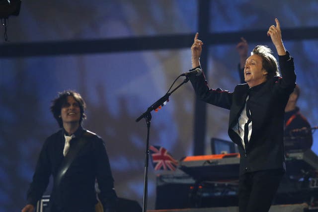 Paul McCartney performs at the climax of the Olympic ceremony