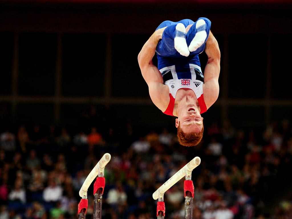 Saturday 28 July: Daniel Purvis of Great Britain performs on the Artistic Gymnastics Men's Parallel Bars on day one of the London 2012 Olympic Games at North Greenwich Arena