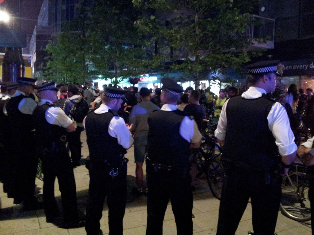Police kettle the group of cyclists near Stratford Bridge