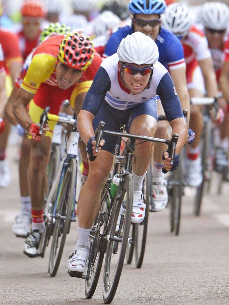 Mark Cavendish sprints next to Sylvain Chavanel of France, right, during the Olympic road race on Saturday