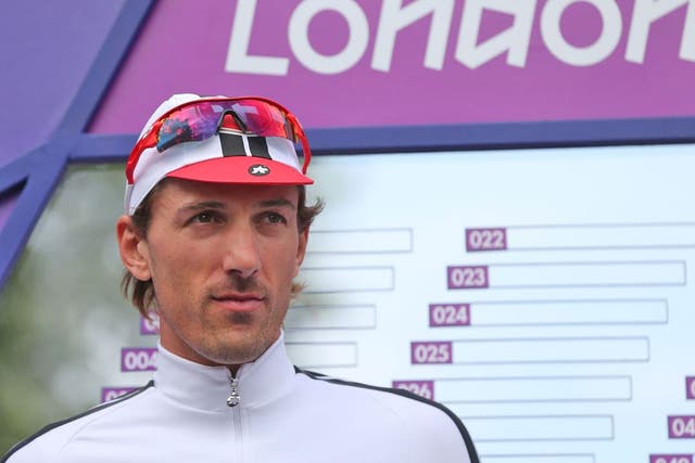 Fabian Cancellara, a four-time world time-trial champion, tumbled on a right-hand corner in the final stages of the road race