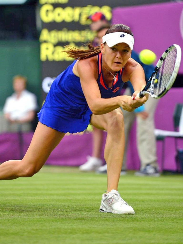 Poland's Agnieszka Radwanska returns to Julia Goerges of Germany during their London 2012 Olympic Games women's singles tennis match