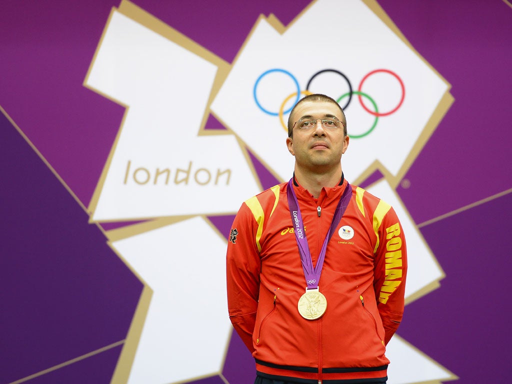 Romanian shooter Alin George Moldoveanu claimed the first gold of the day in the men's 10m air rifle