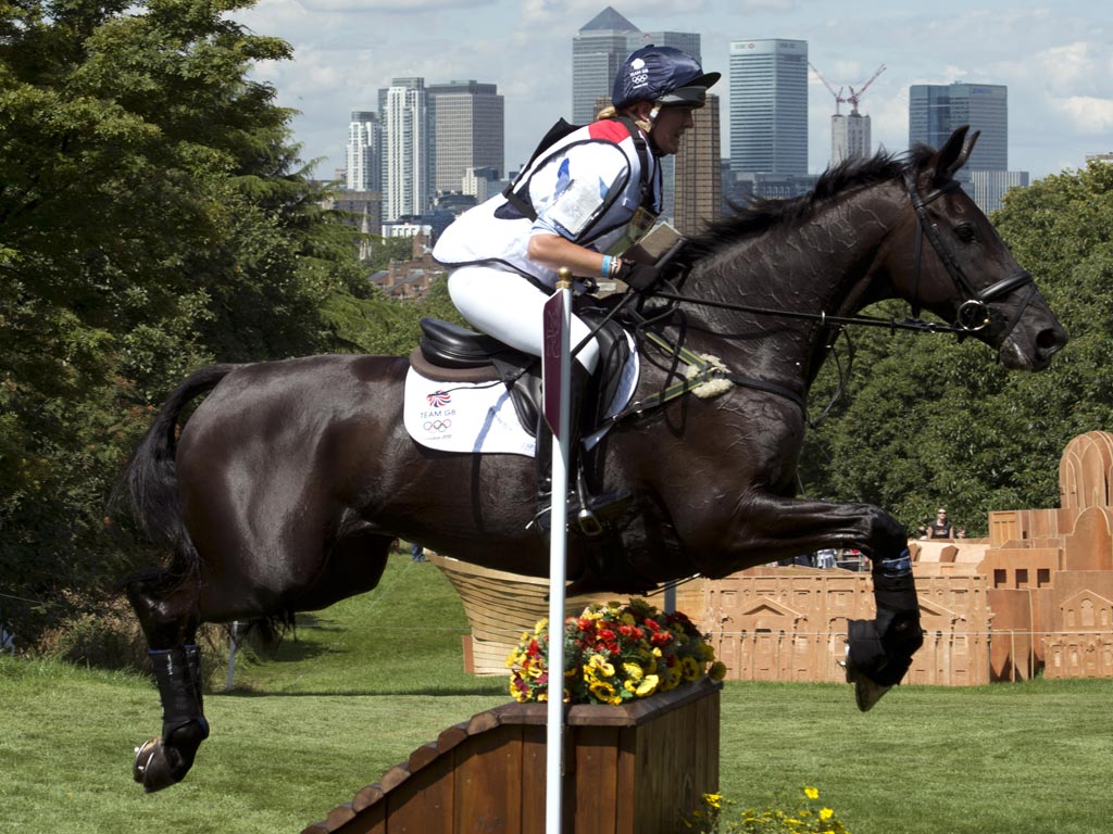 July 30, 2012: Great Britain's Nicola Wilson on Opposition Buzz competes in the cross country phase of the eventing equestrian competition in Greenwich Park