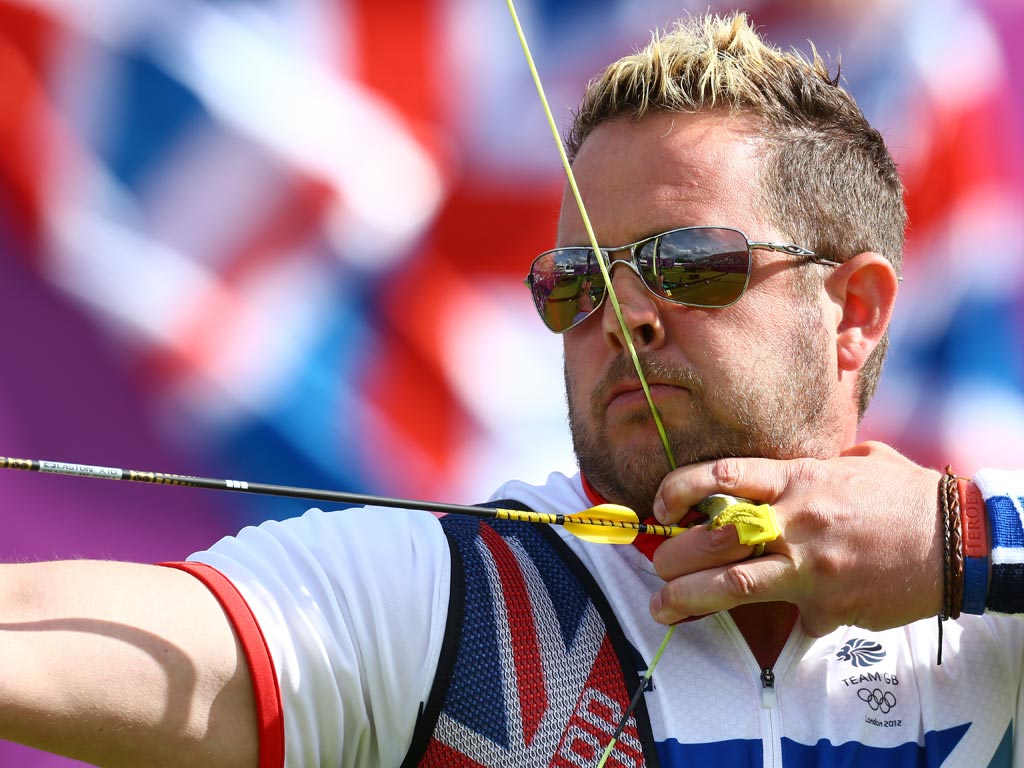 July 30, 2012: Larry Godfrey of Great Britain competes in his Men's Individual 1/32 Eliminations Archery match against Emdadul Haque Milon of Bangladesh