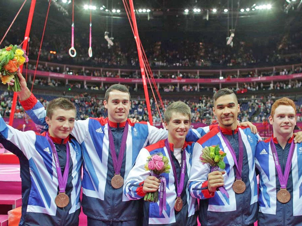 Oldham, Thomas. Whitlook, Smith and Purvis with their medals