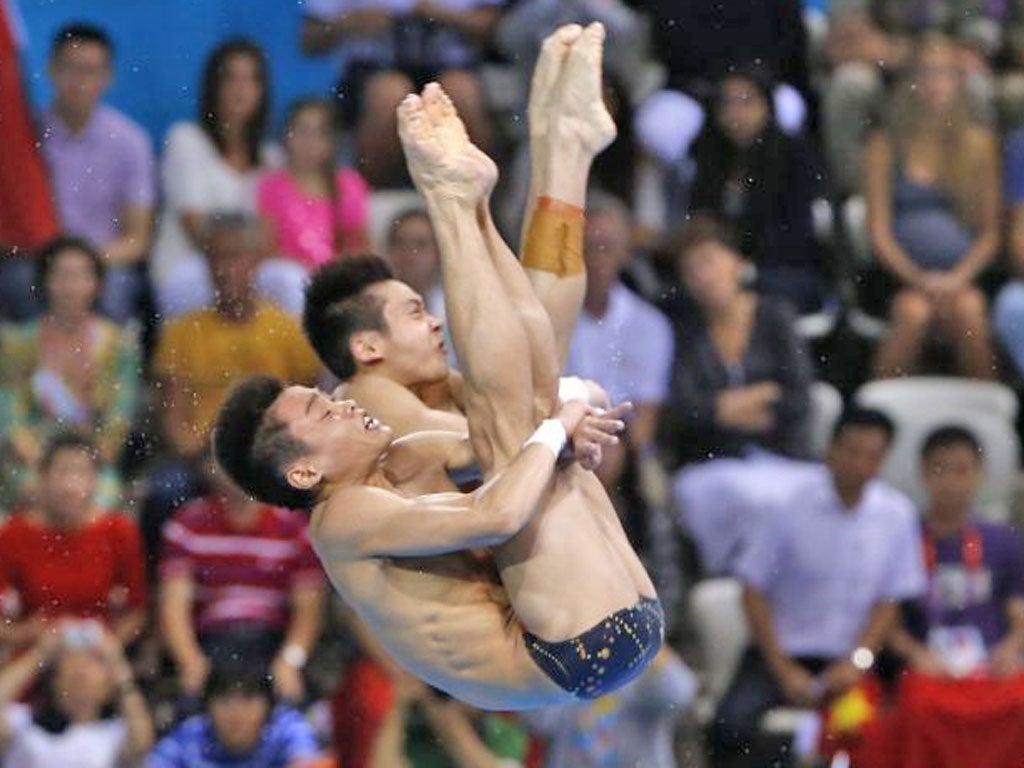 1. DIVING: Six confident and precise dives from the Chinese teenage pair Cao Yuan and Zhang Yanquan won the gold medal in the men’s synchronised 10m platform event yesterday afternoon