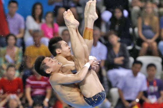 1. DIVING: Six confident and precise dives from the Chinese teenage pair Cao Yuan and Zhang Yanquan won the gold medal in the men’s synchronised 10m platform event yesterday afternoon