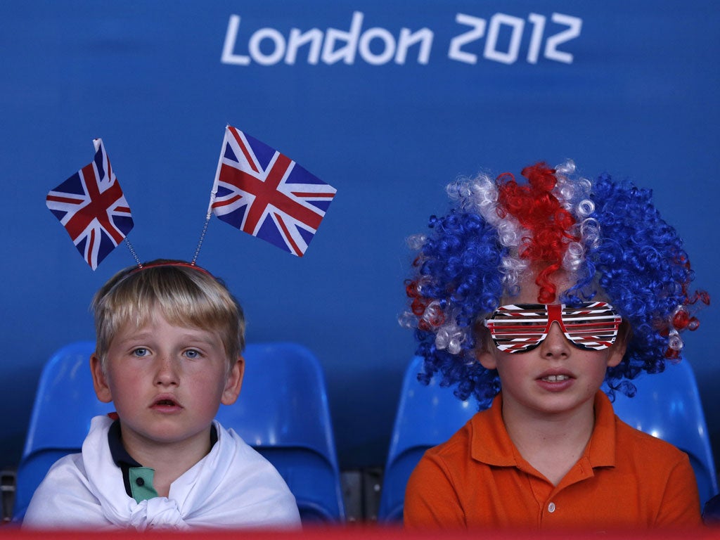 July 31, 2012: Young spectators watch the men's -81kg and women's 63kg judo competition at the London 2012 Olympic Games.