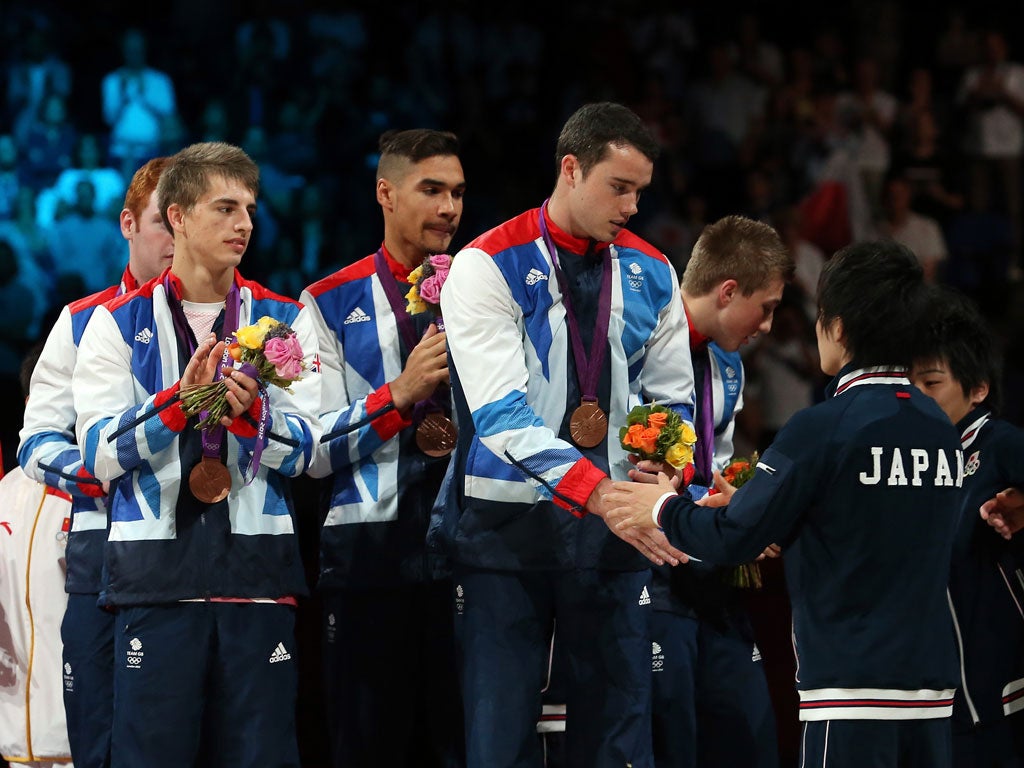 The British men's gymnastics team with their bronze medals