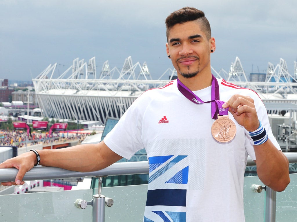 Louis Smith displays his bronze from the men’s team event