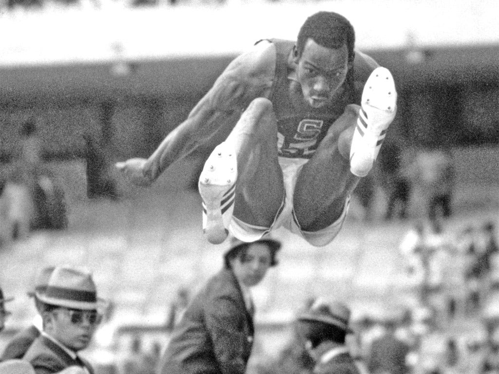 Bob Beamon smashes the long-jump record at the 1968 Mexico Olympics