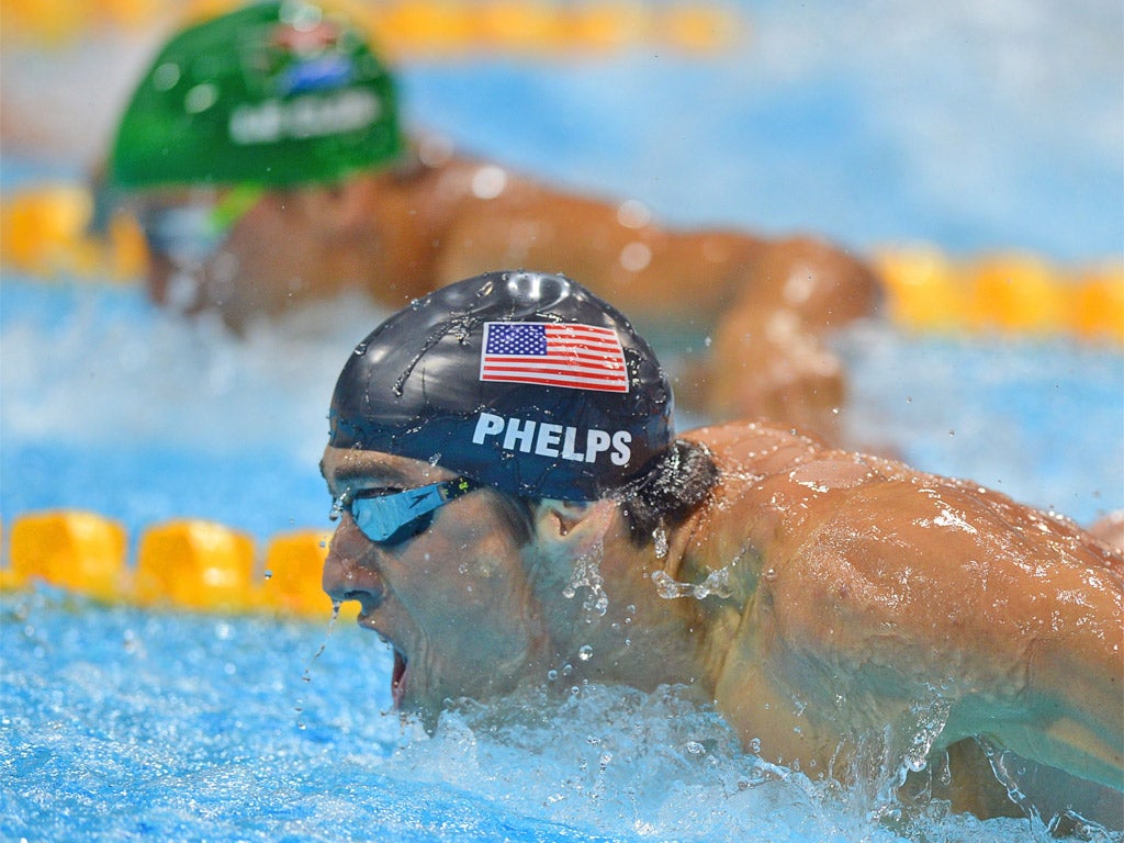 Michael Phelps is edged out by Chad Le Clos last night