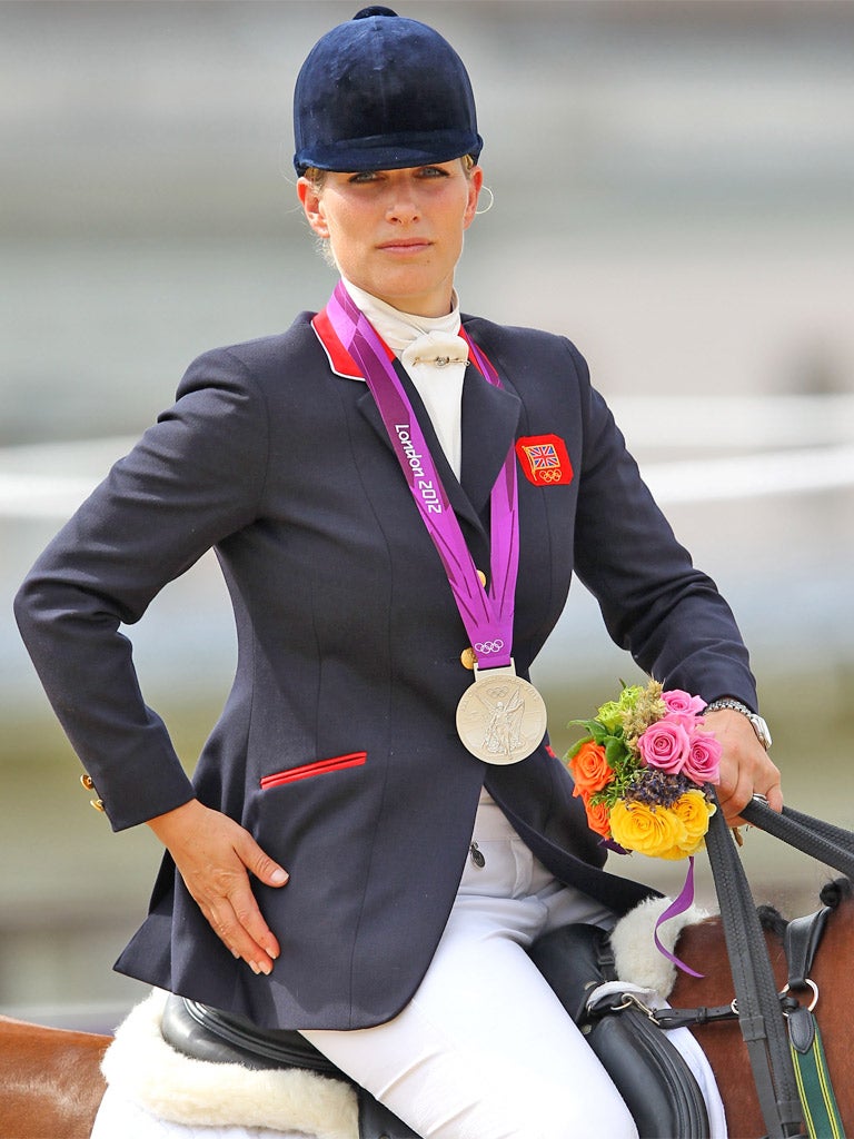 Zara Phillips proudly wears her silver medal