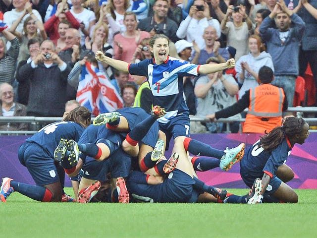 The Team GB players celebrate a historic victory