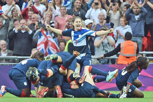 The Team GB players celebrate a historic victory
