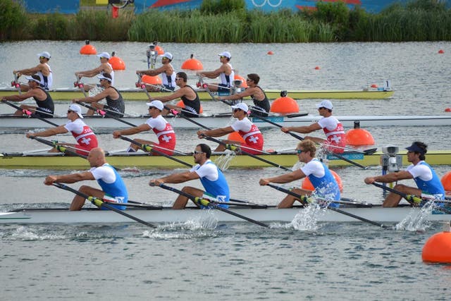 August 1, 2012: (From foreground) Rowers of Italy, Switzerland, New Zealand and the US start running the men's quadruple sculls repechages 1 of the rowing event during the London 2012 Olympic Games, at Eton Dorney 