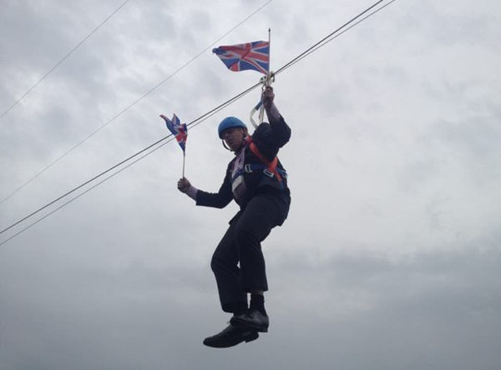 Mr Johnson was the first person to use the 45-metre high, 320-metre long zip wire zip wire which offers views towards the Olympic stadium.  (pic via Rebecca Denton)