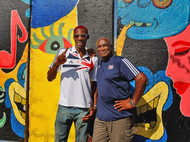 Philips Idowu with his coach Aston Moore