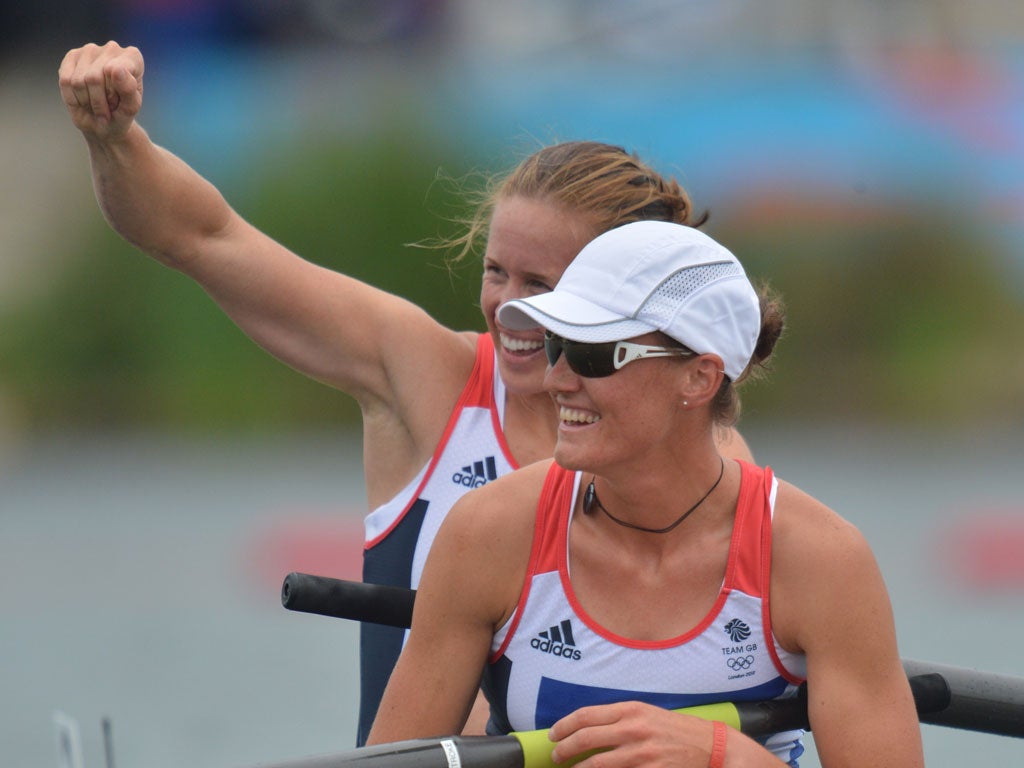 Helen Glover and Heather Stanning of Great Britain celebrate in their boat after winning gold in the Women's Pair Final