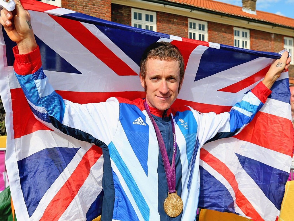 16.01 - Gold for Bradley Wiggins in the men's time trial, beating Germany’s Tony Martin by 42 seconds. Bronze goes to Britain’s Chris Froome