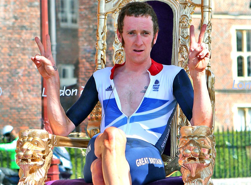 Olympic gold medallist Bradley Wiggins has called for cycling helmets to be made compulsory