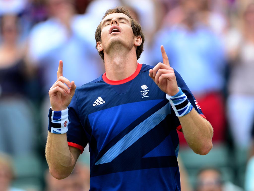 August 2, 2012: Britain's Andy Murray celebrates his victory over Spain's Nicolas Almagro during their men's singles tennis match quarter-final at Wimbledon