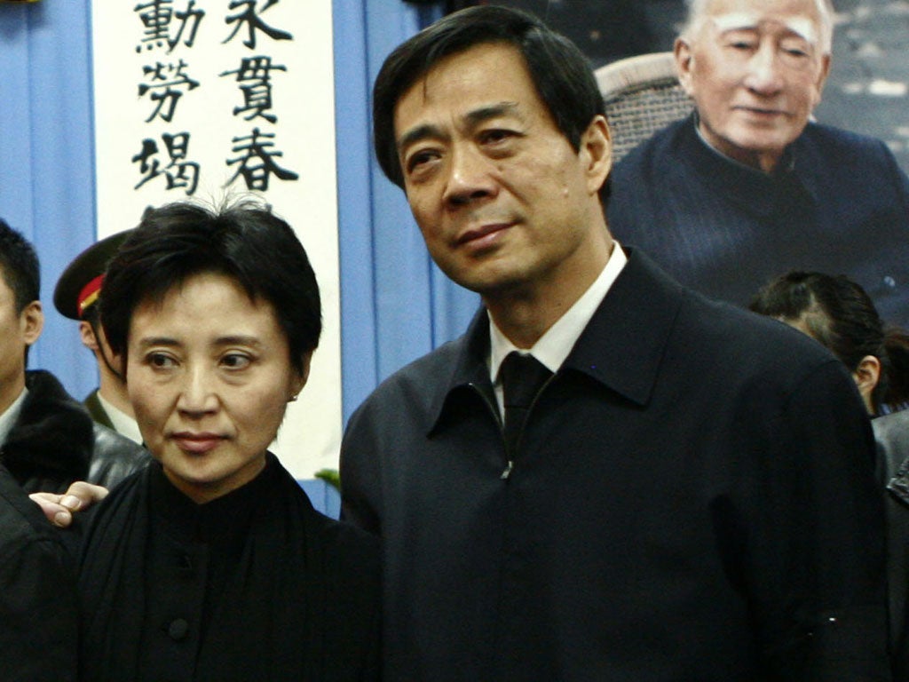 Gu Kailai, left, and her husband Bo Xilai, a former party boss. She now faces the death penalty
