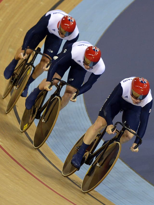 Chris Hoy, Jason Kenny and Philip Hindes in action in the team sprint yesterday