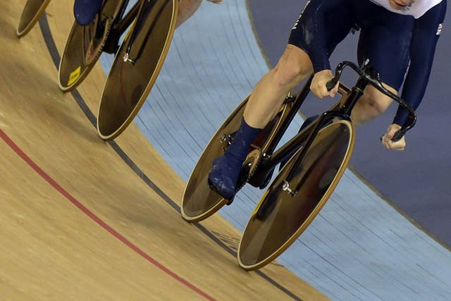Chris Hoy, Jason Kenny and Philip Hindes in action in the team sprint yesterday