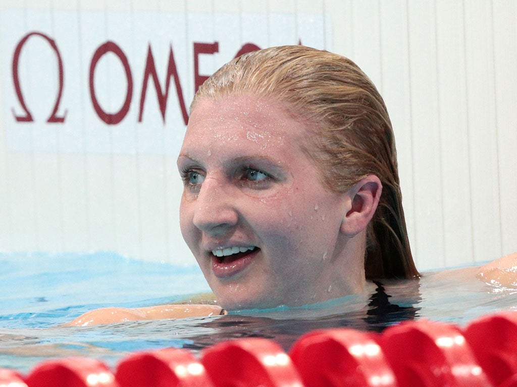 Rebecca Adlington can afford to smile after making a statement in yesterday's qualifying round