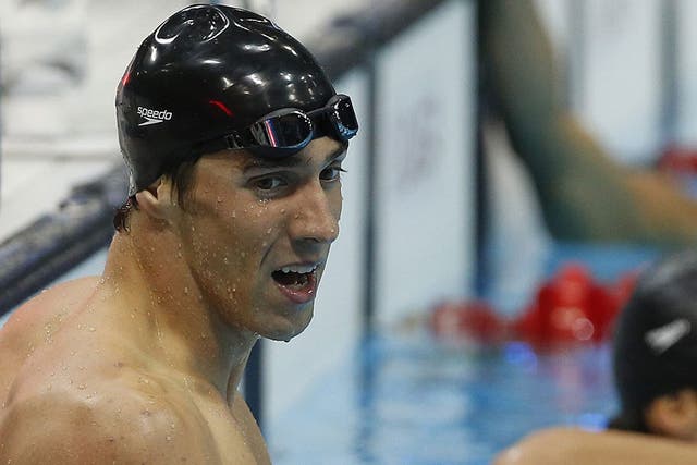 Michael Phelps enjoys the victory over his friend Ryan Lochte
