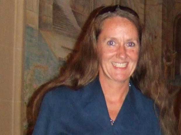 Carole Waugh's body was found with a single stab wound inside a car at a garage in Lime Court